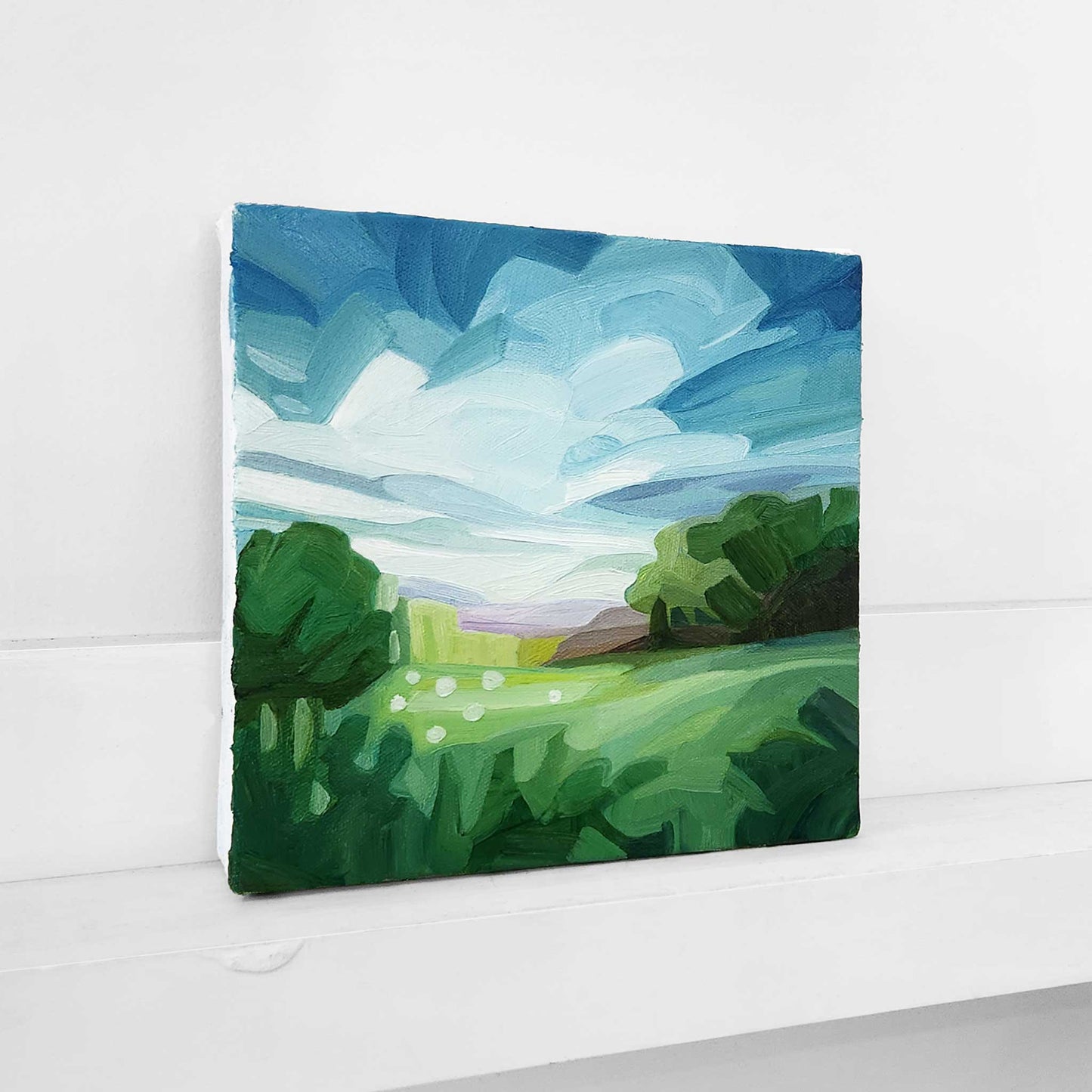 Colourful meadow landscape oil painting inspired by the beauty of the countryside.