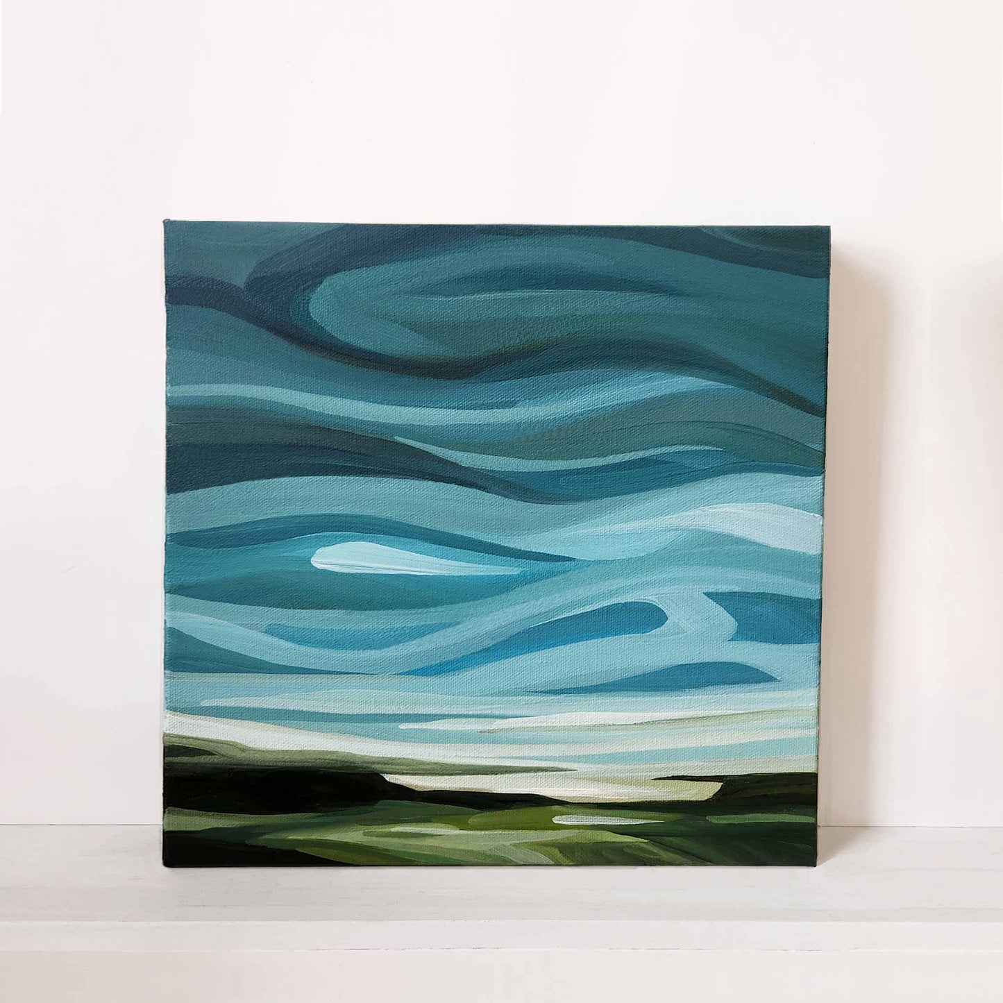 the shape of wind painted in the teals and blue of an abstract sky painting