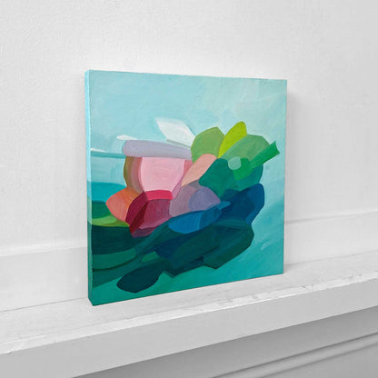 original abstract oil painting with organic green blue and pink shapes on a teal background