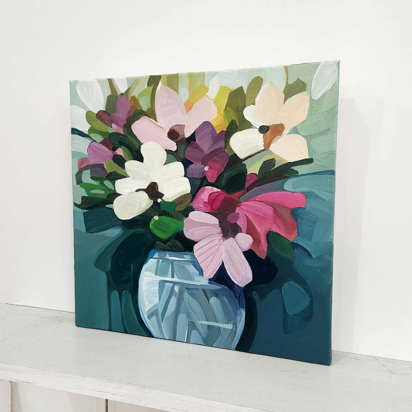 Abstract floral artwork on teal canvas by Susannah Bleasby