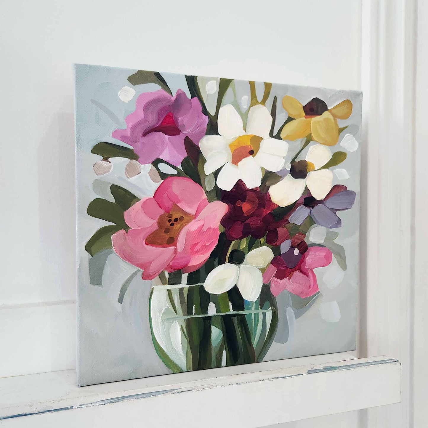 colourful floral painting on soft blue background
