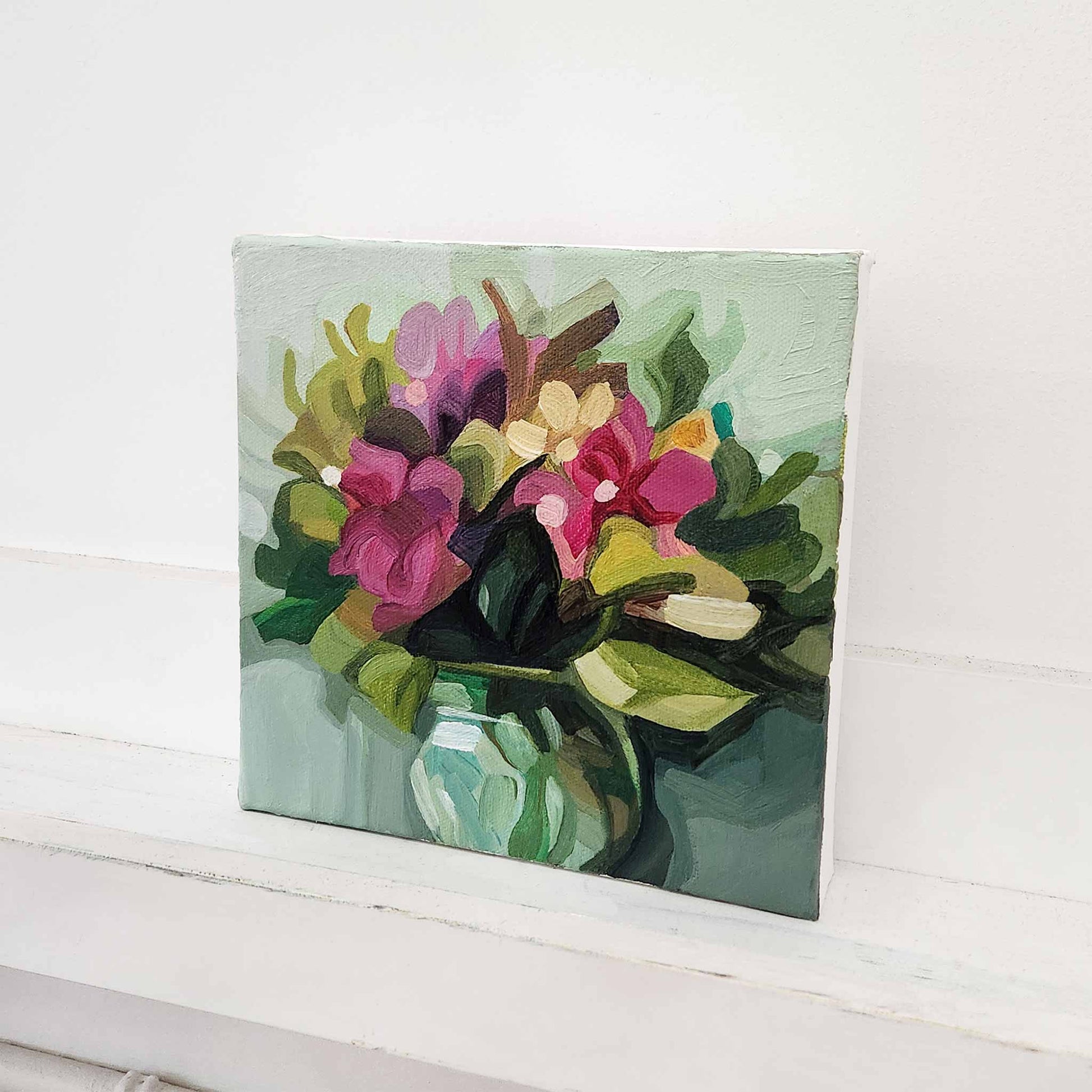 Colourful abstract flower bouquet artwork with soft green backdrop, modern floral painting