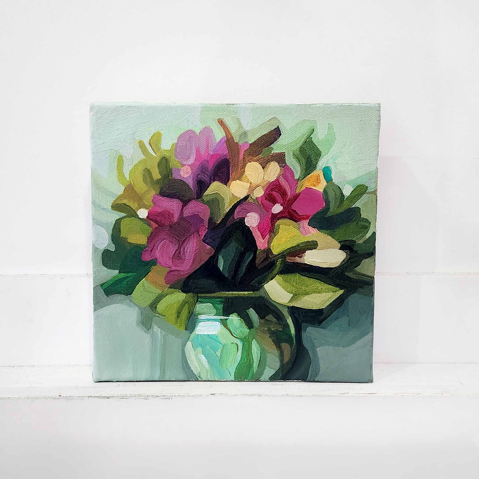 Contemporary bright floral bouquet painting on light green background by Susannah Bleasby