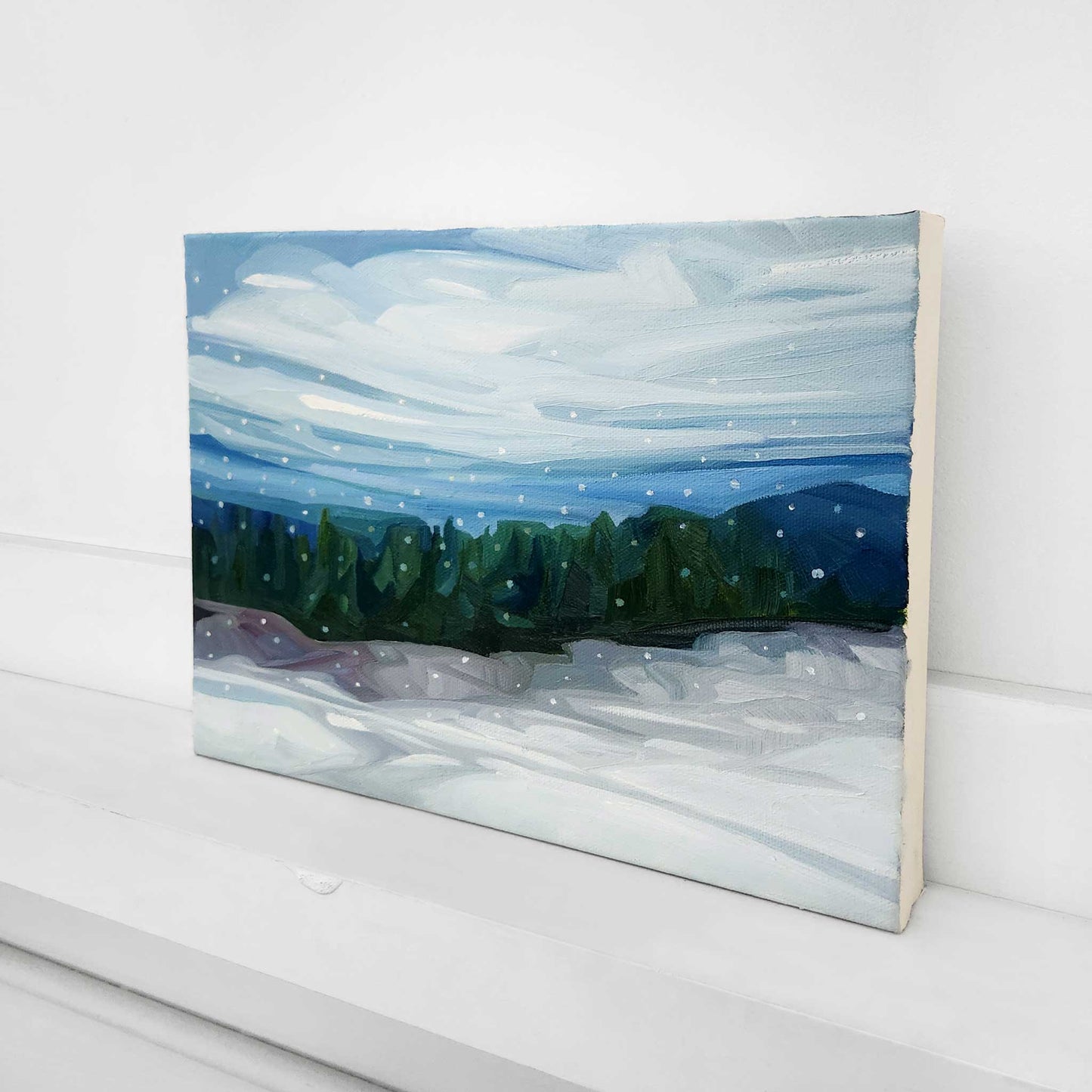 Original winter countryside painting capturing the calm of a snowfall.