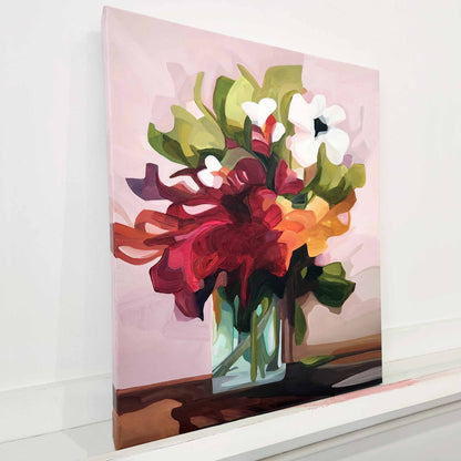 painting of red flowers in a vase