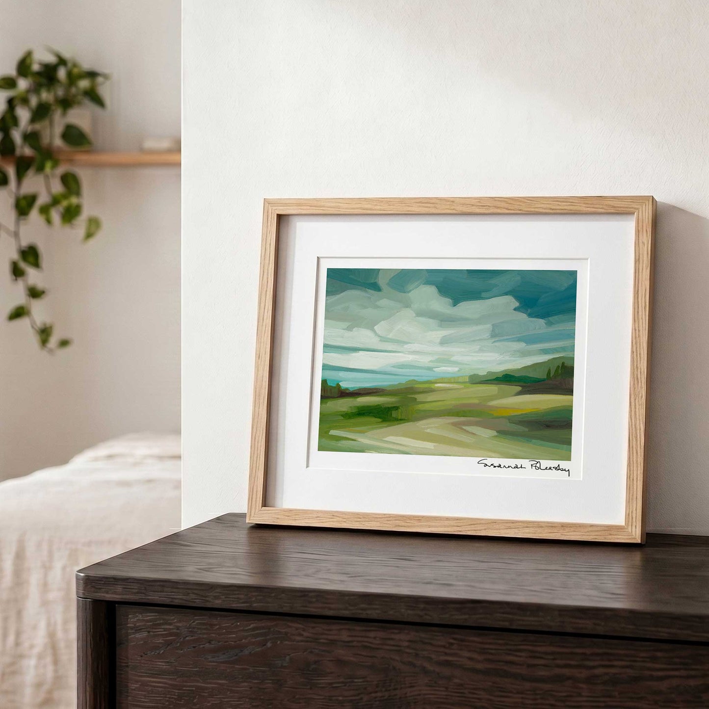 Contemporary countryside wall art featuring gentle hills, open skies and cloud shadows moving across the landscape