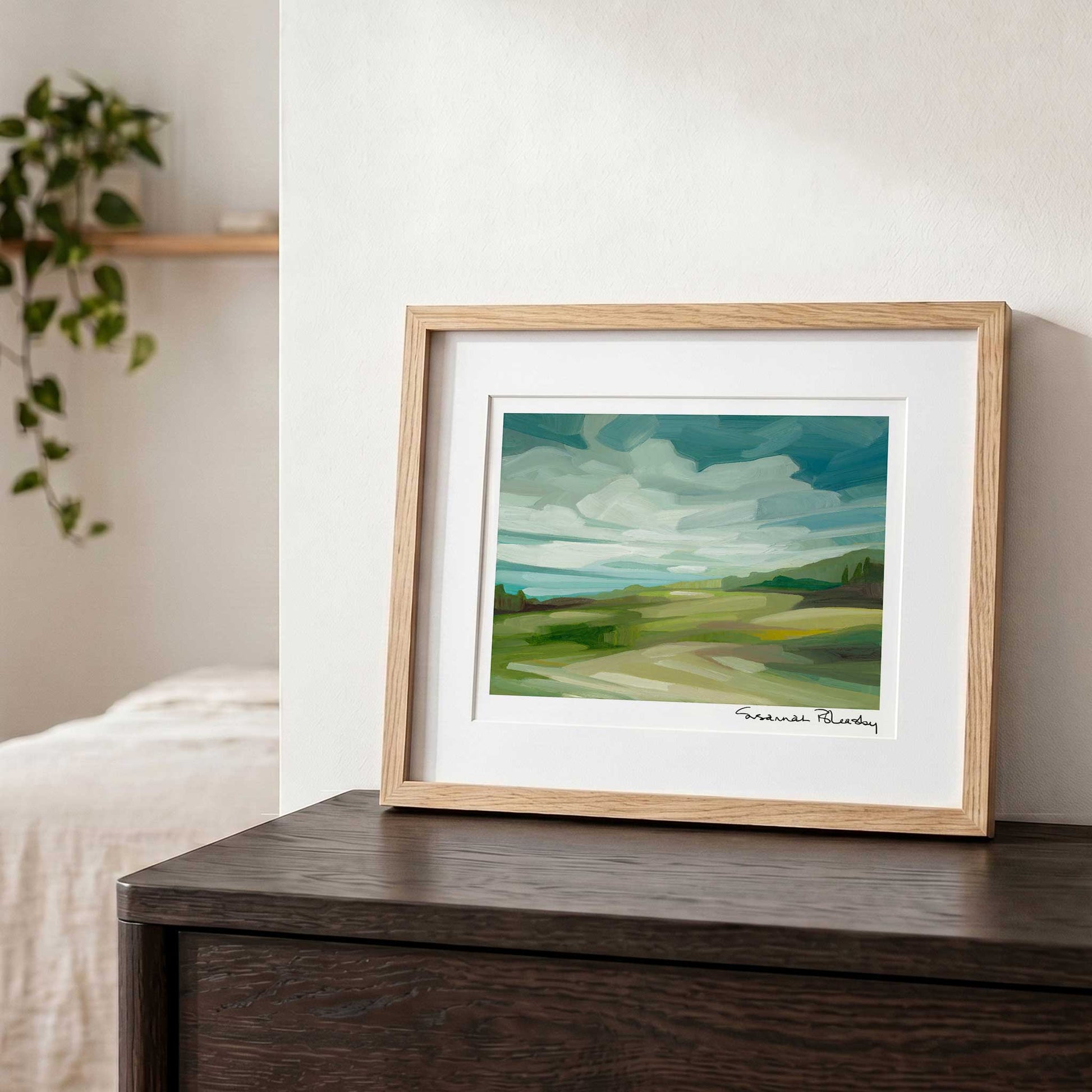 Contemporary countryside wall art featuring gentle hills, open skies and cloud shadows moving across the landscape