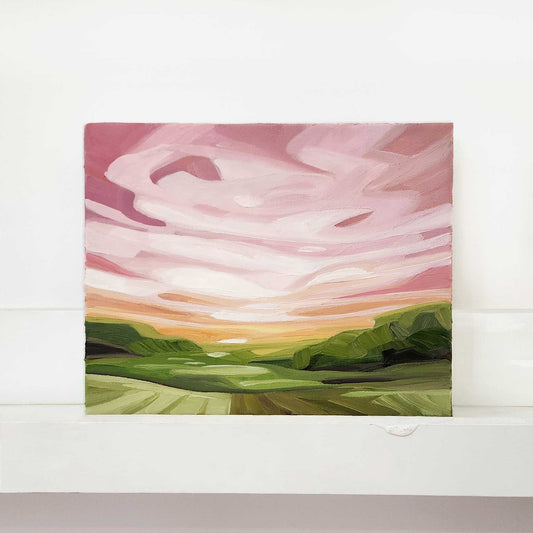 Contemporary abstract oil painting featuring expressive pink skies over a landscape.