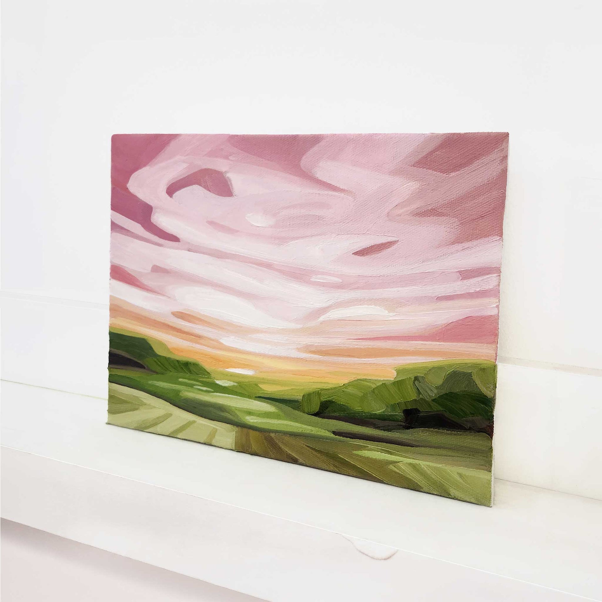 Abstract landscape oil painting with expressive pink skies and bold brushstrokes.