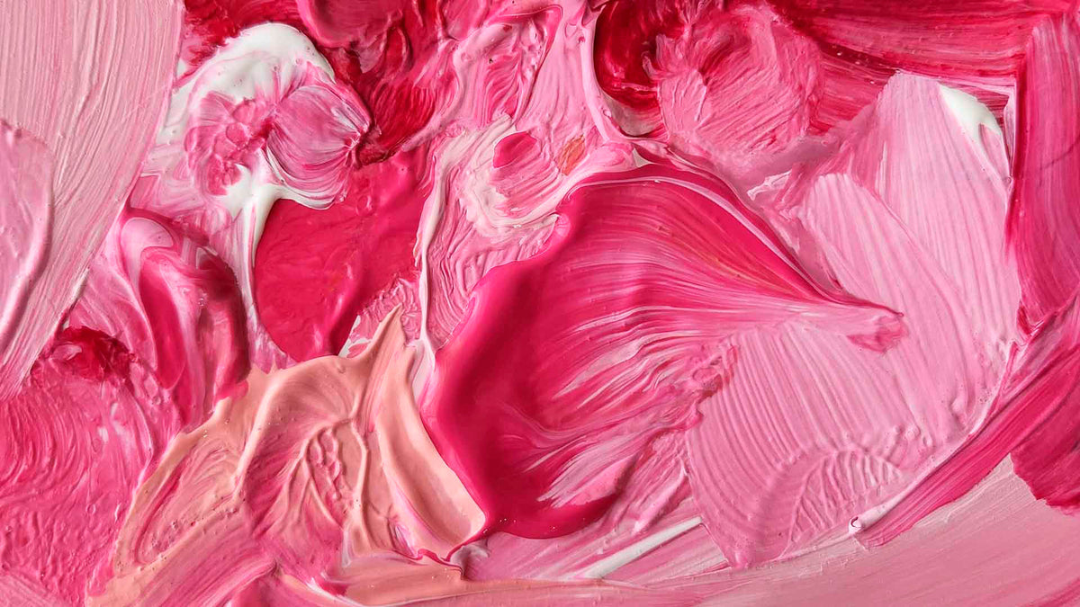 swirls of pink paint on a palette