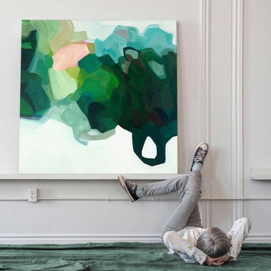 Canadian abstract artist Susannah Bleasby with her oversized jade green abstract acrylic painting precious