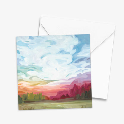 Colourful landscape greeting card inspired by rainbow sunset skies, warm evening light, and peaceful summer scenery