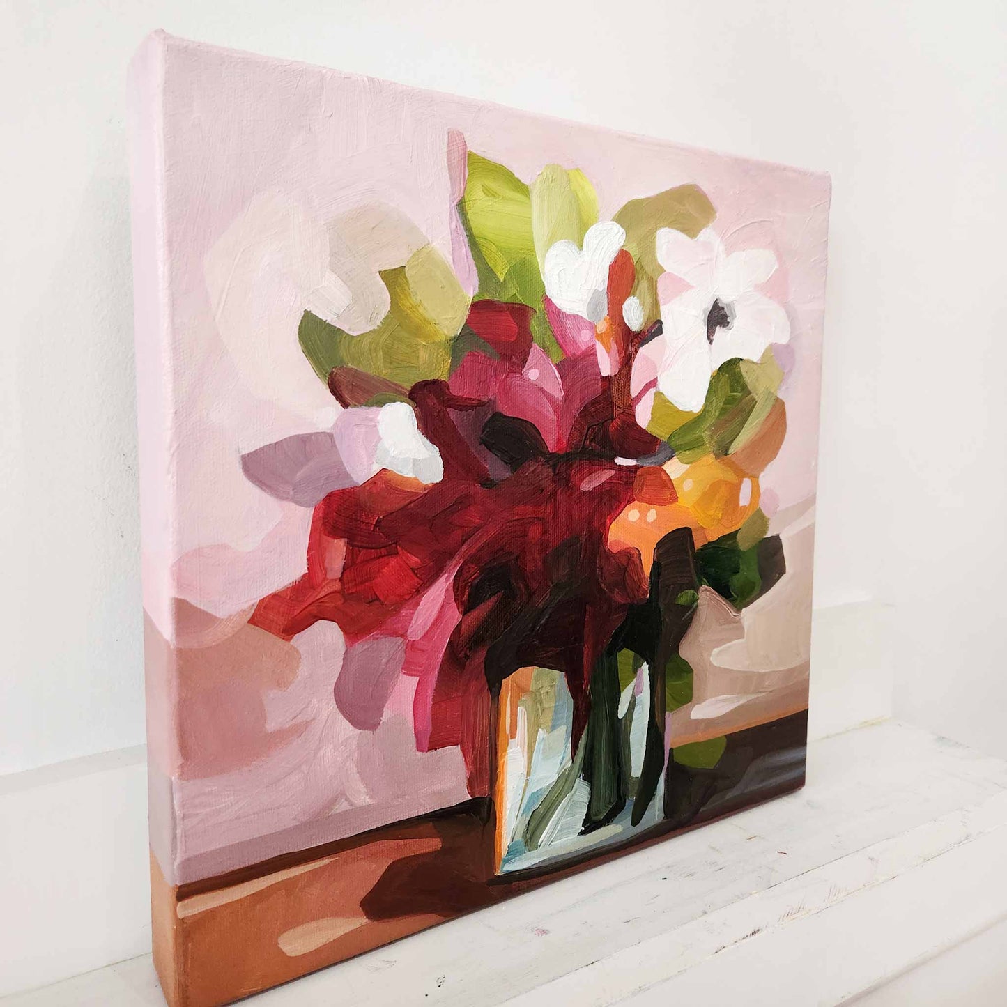 acrylic flower painting of red blooms in a vase