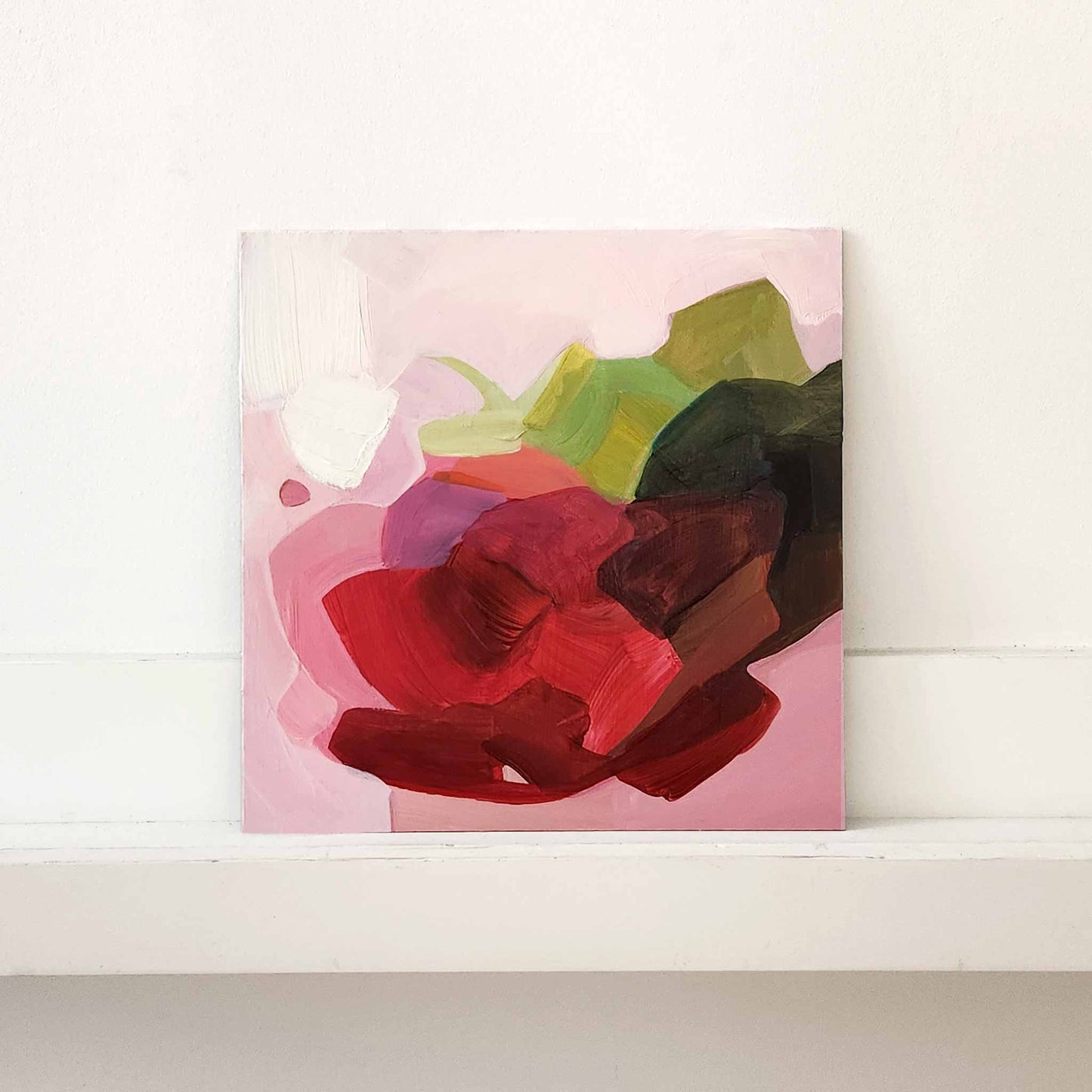 abstract floral painting with red blossoms