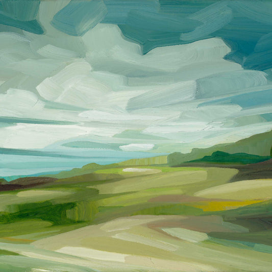 Colourful landscape art print of peaceful rolling countryside beneath shifting clouds and a soft blue sky.