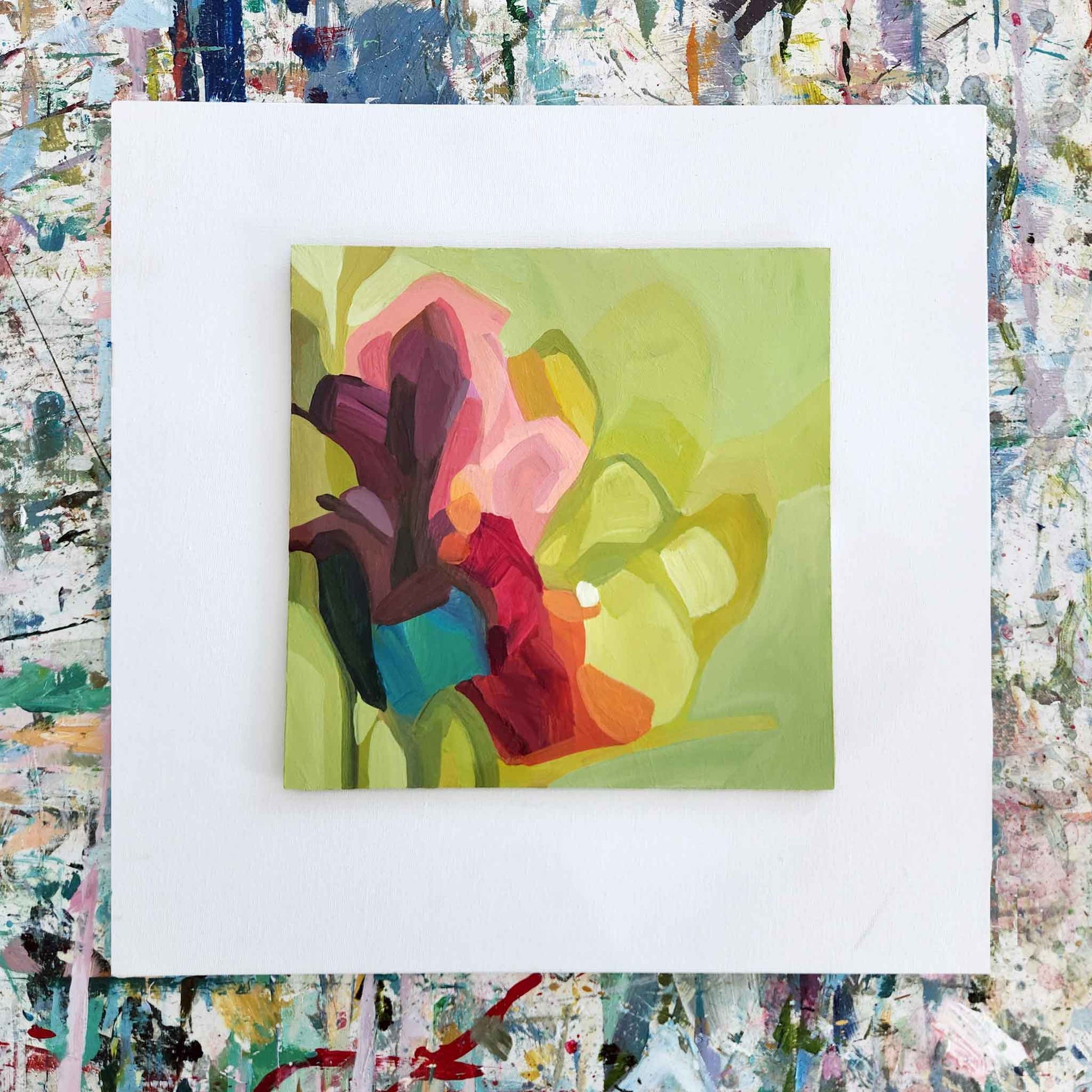 overhead view of small green abstract painting