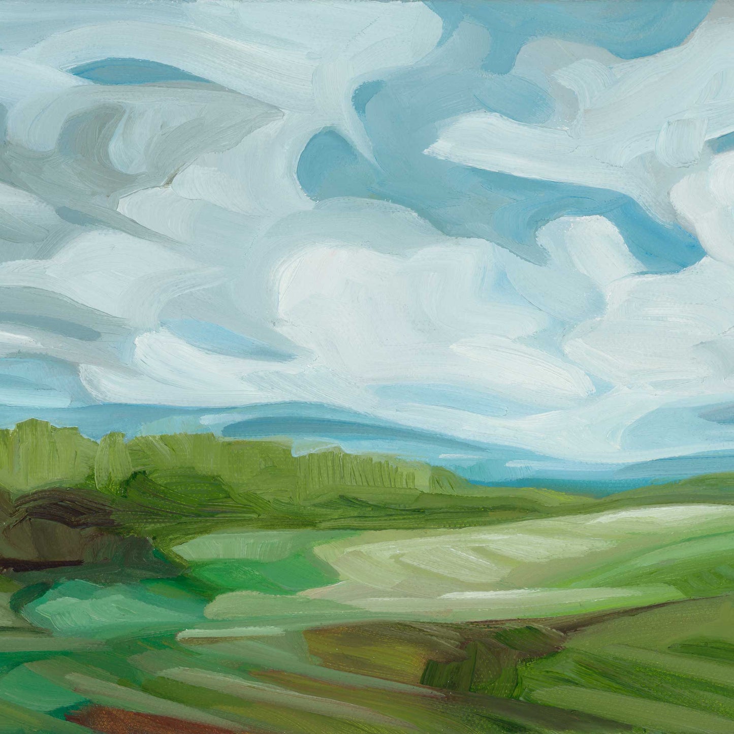 Colourful spring countryside landscape art print with fresh green fields beneath a bright blue, cloud-filled sky