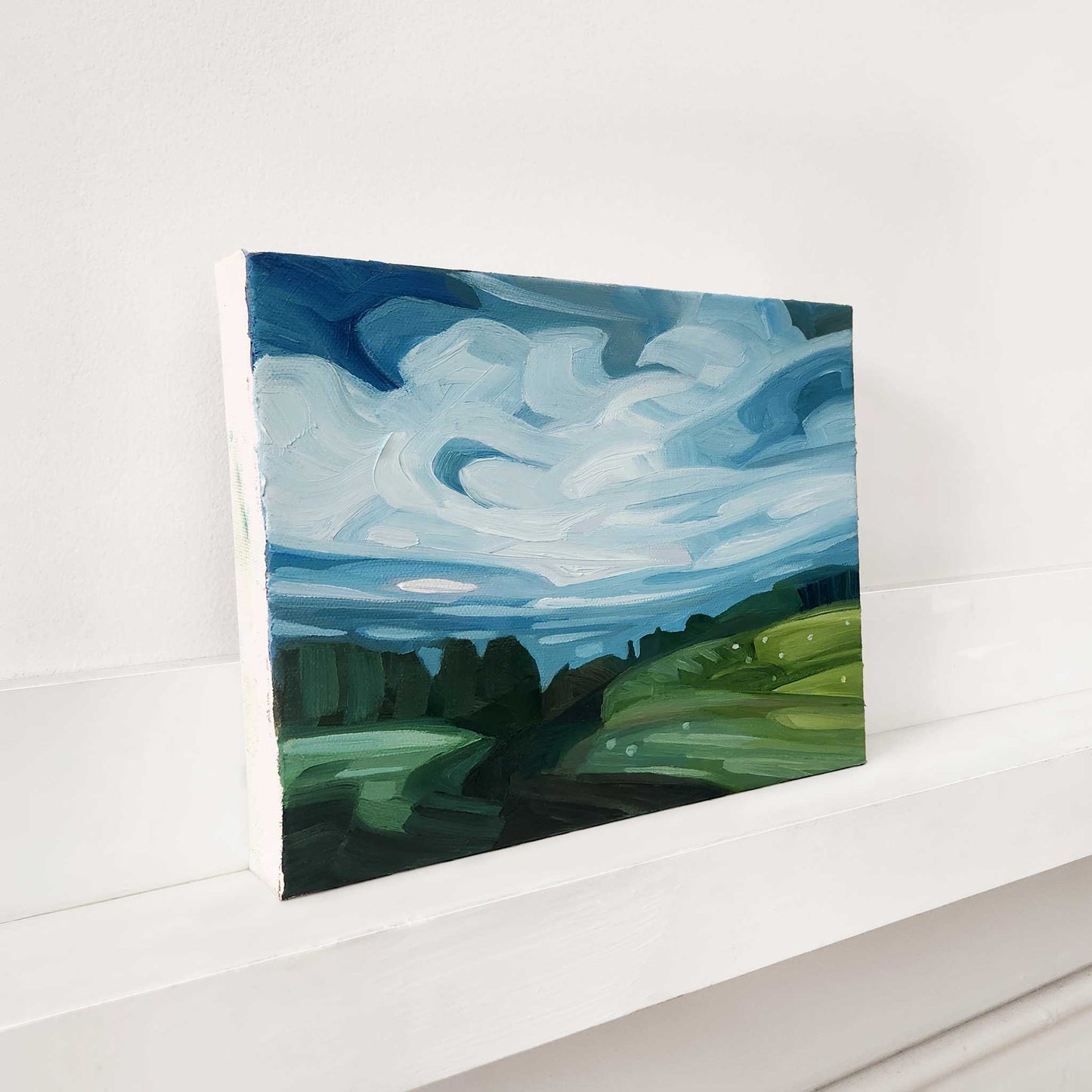 Contemporary oil painting of a colourful summer countryside landscape.