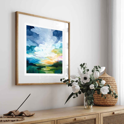 Summer sunrise landscape wall art displayed in a living room