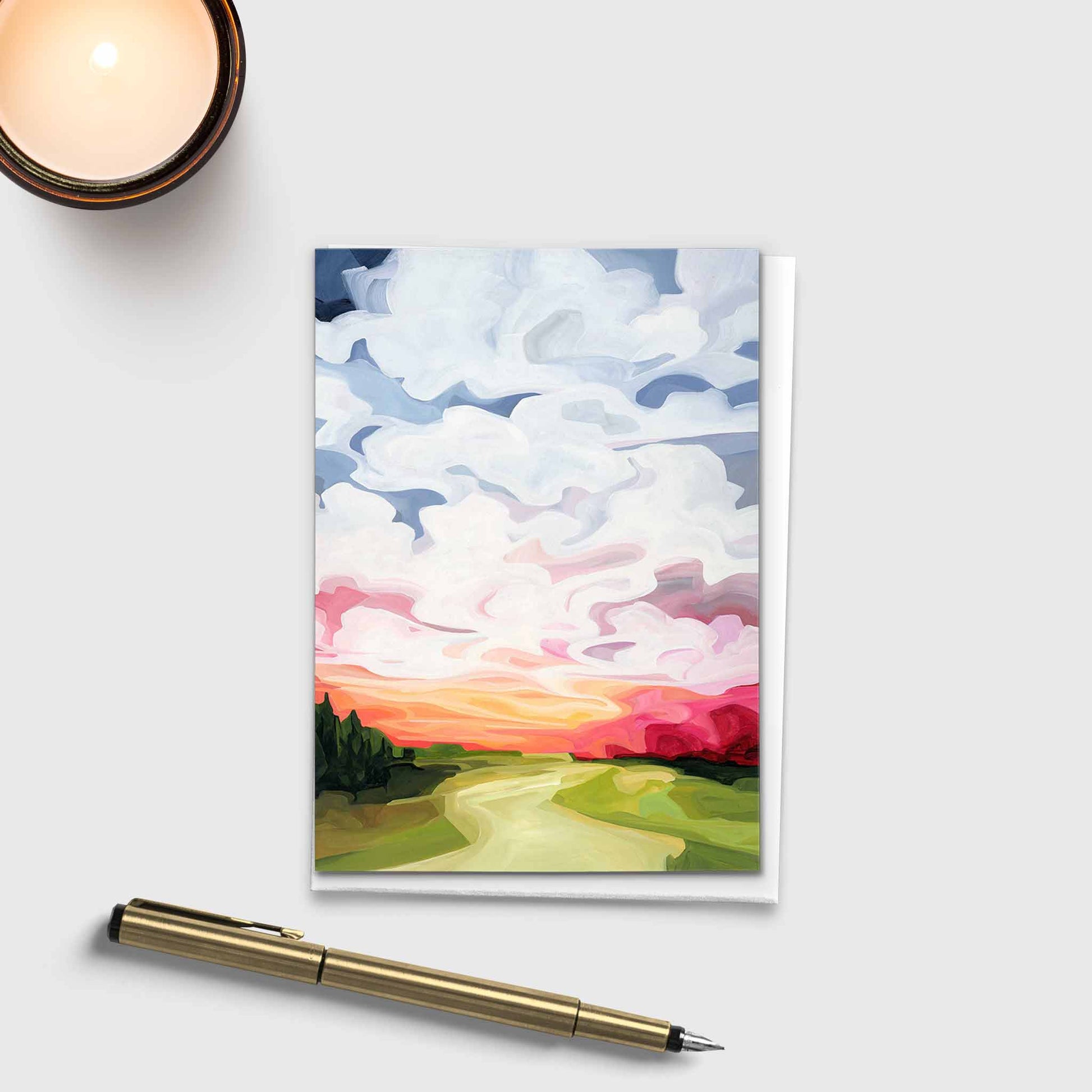 Blank greeting card inspired by bright pink sunrise landscape
