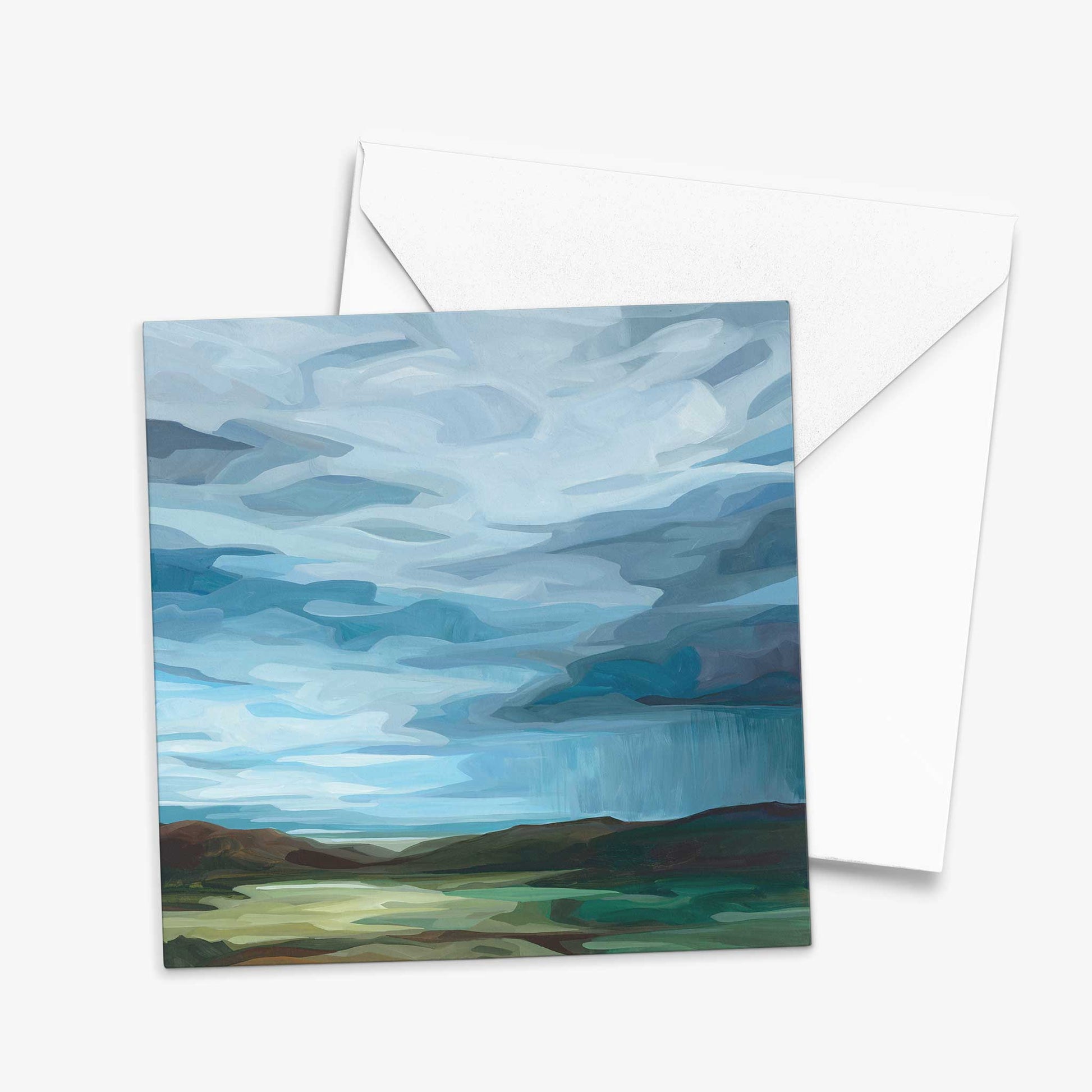 Abstract sky art greeting card featuring dramatic storm clouds moving across luminous blue summer skies.