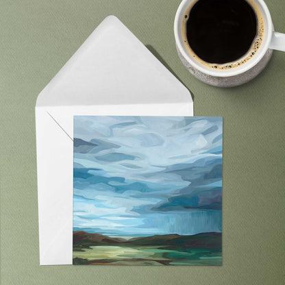 Fine art greeting card with sweeping storm clouds, sunlight, and expressive abstract sky painting.