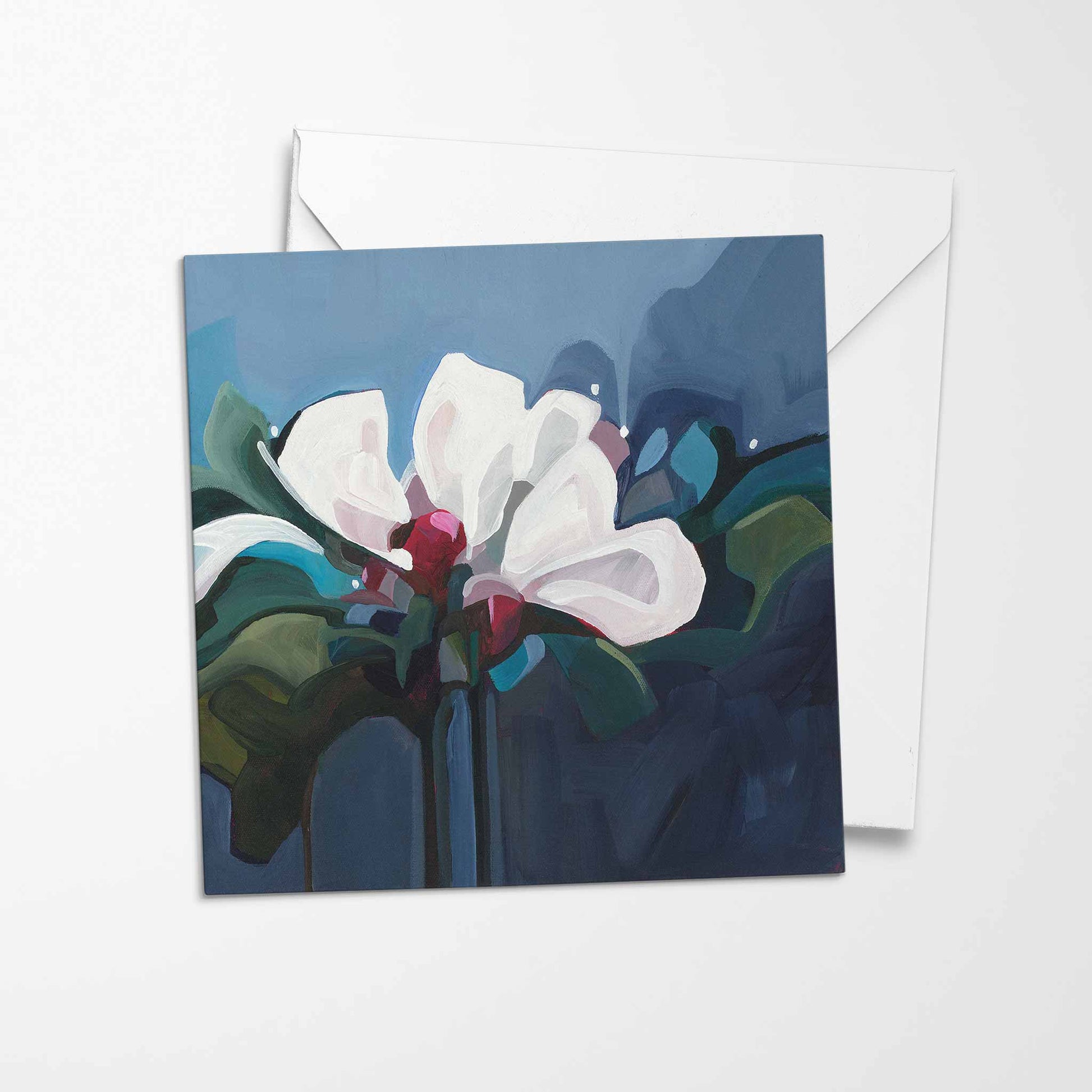 white flower greeting card dark blue background