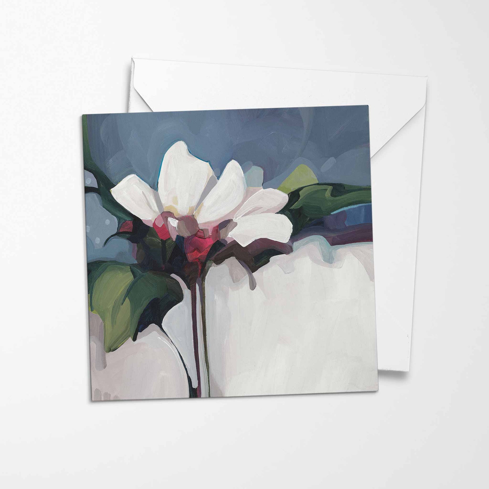 white flower greeting card navy background