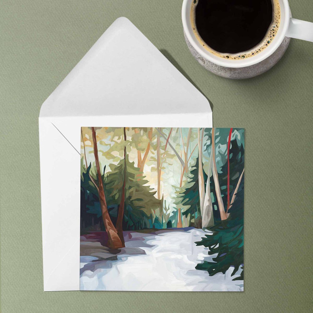 Snowy forest art card featuring a winter woodland trail and soft sunlight