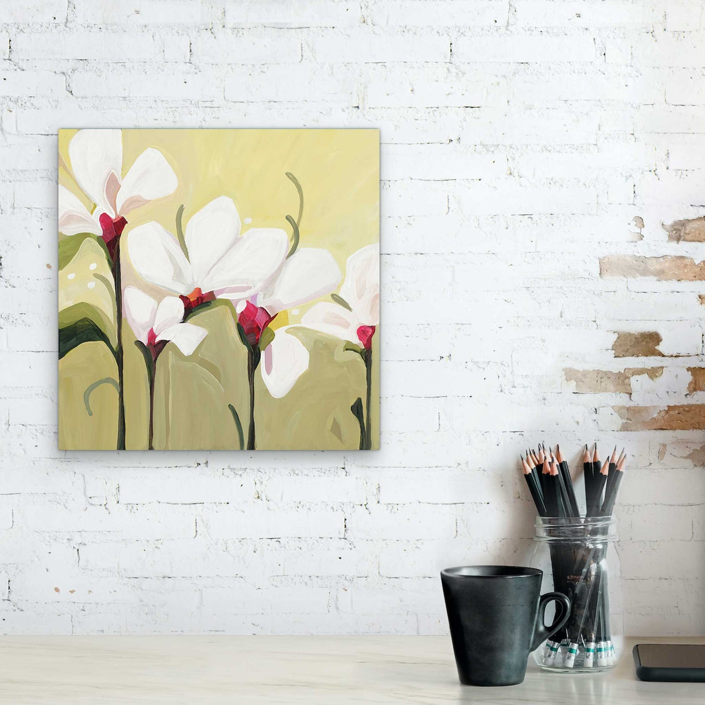 an acrylic flower painting of delicate white flowers set against a sage green and yellow background