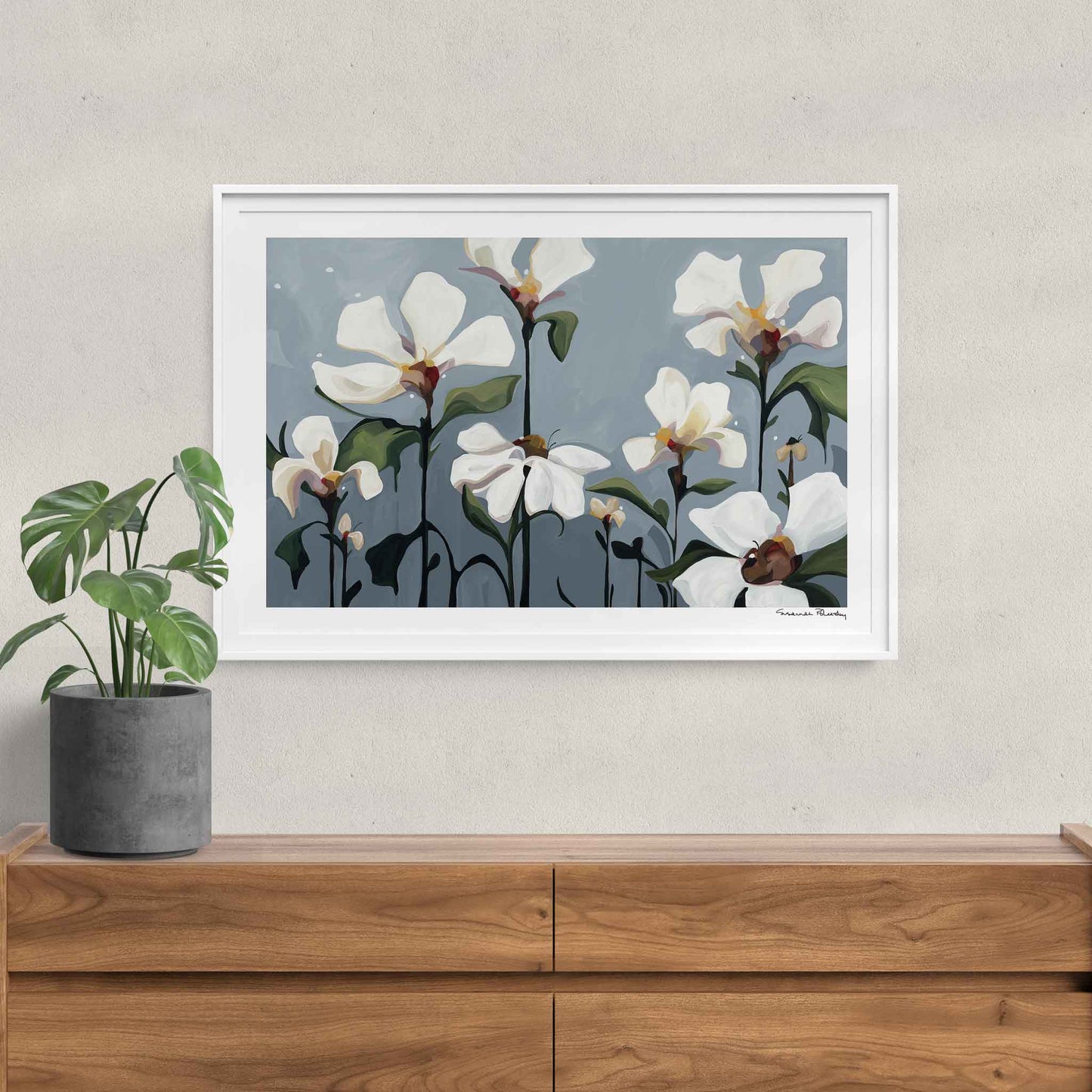 Acrylic flower painting print with creamy white flowers framed as wall art hanging over bedroom dresser