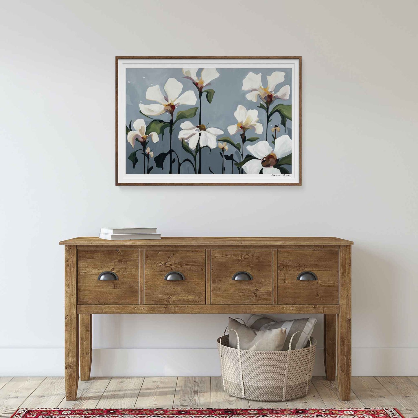 Large horizontal acrylic flower painting print with creamy blossoms on grey background hanging as wall art with walnut frame