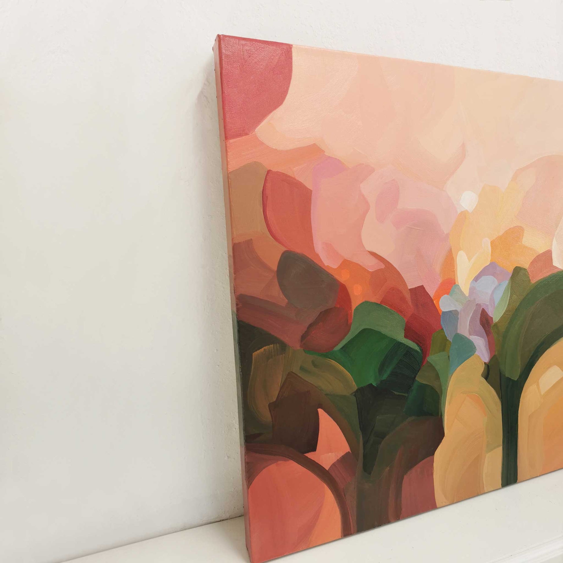 peach and coral abstract acrylic painting side view of painted canvas edges