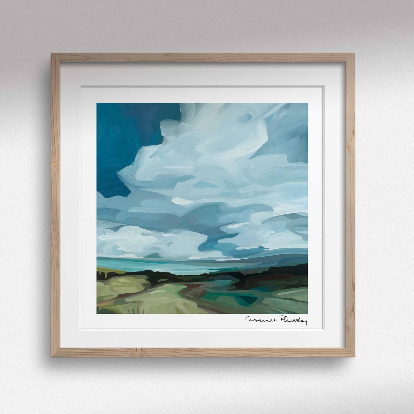 square framed art print of an abstract landscape acrylic sky painting with big blue sky and green fields