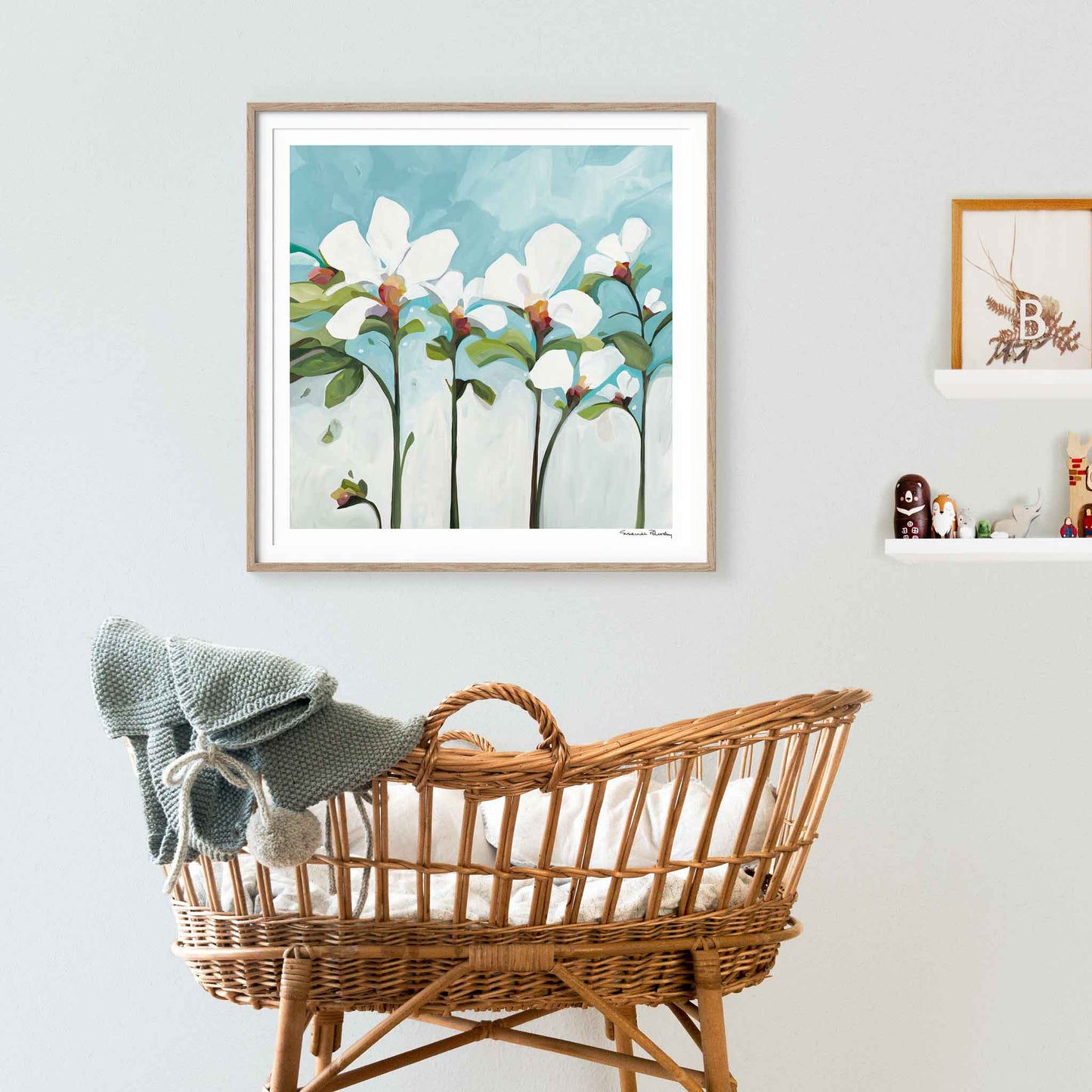 Large framed acrylic flower painting print hanging as nursery art a lovely nursery decor idea